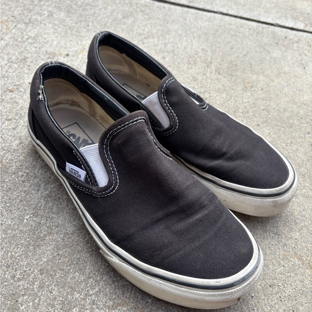 Vans Black and White Slip-On Sneakers